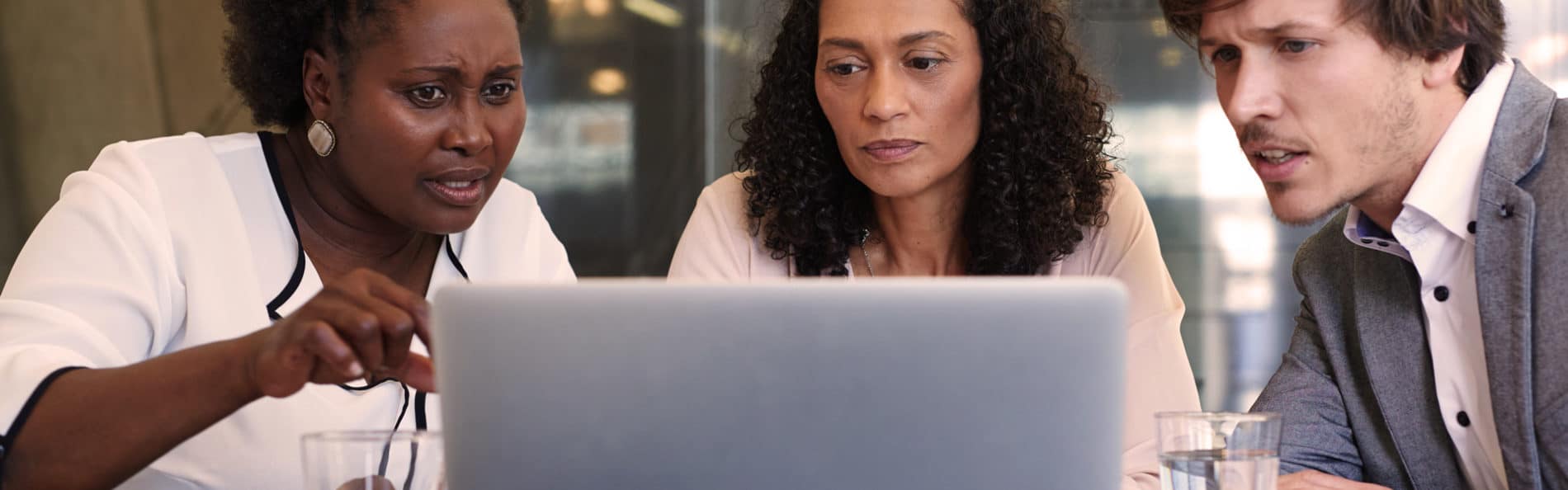 People looking at computer