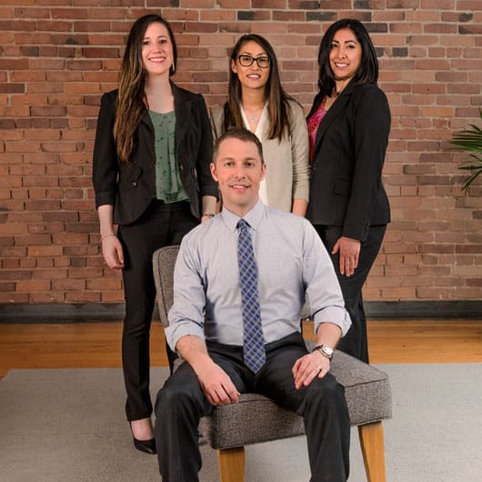 Attorney Steven Anglés and the Spanish speaking staff of Adler Giersch