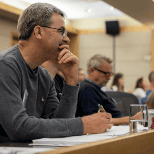 Attendees listening at a personal injury claims workshop session.